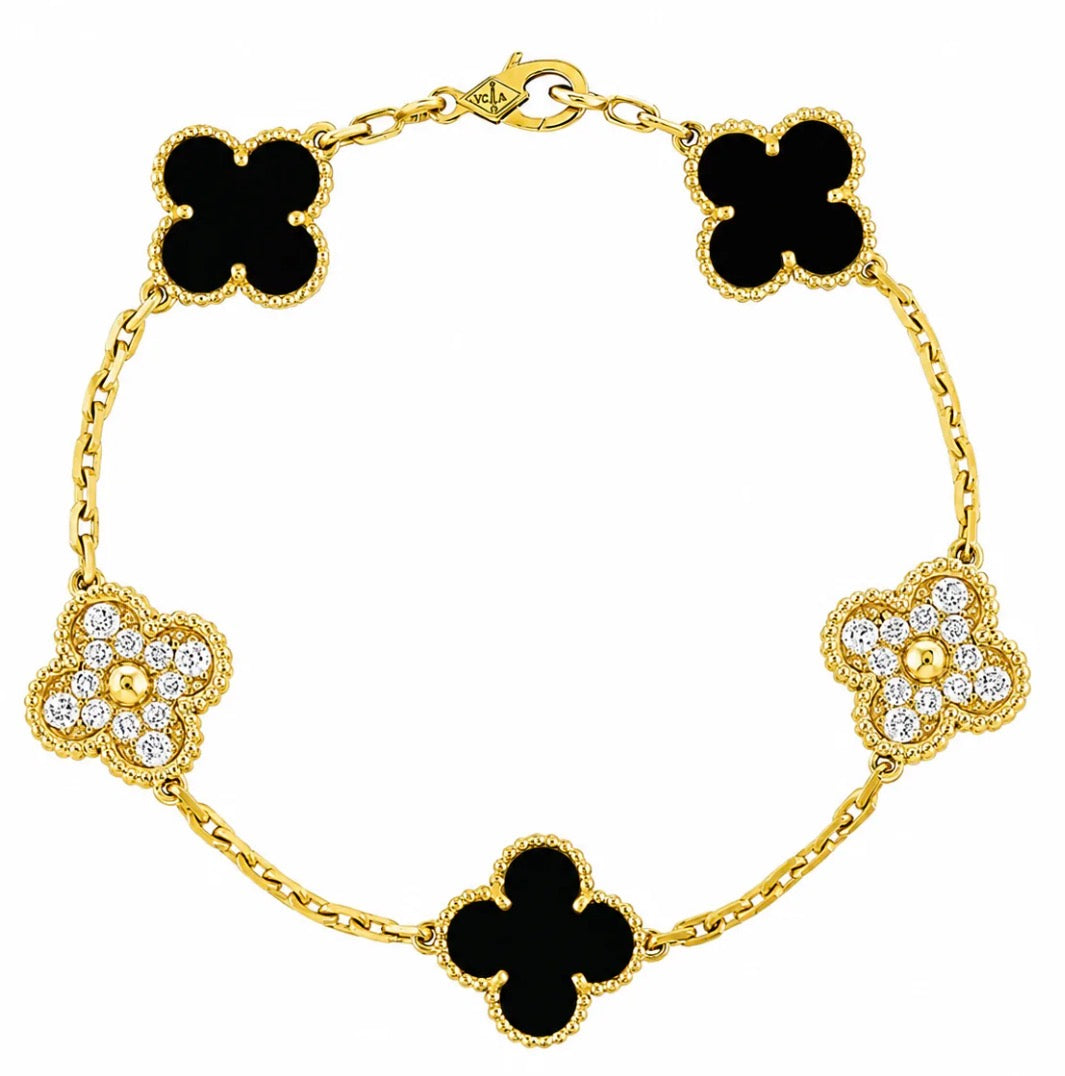 VAN CLEEF NEGRO CON DORADO (INCLUYE: BOLSA, CERTIFICADO, ESTUCHE, BOLSA)