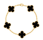 VAN CLEEF NEGRO CON DORADO  (INCLUYE: BOLSA, CERTIFICADO, ESTUCHE, BOLSA)
